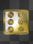 Spinning Gold Dice on Black